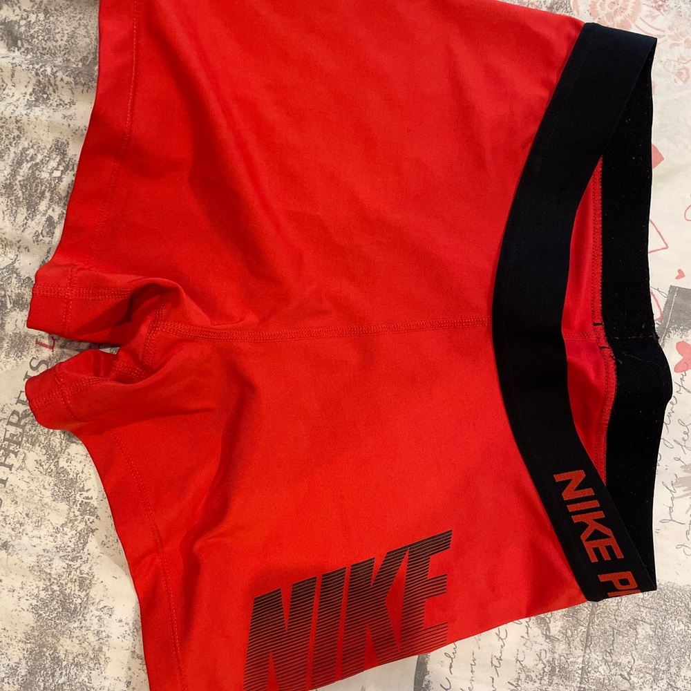 Red Nike pros size large